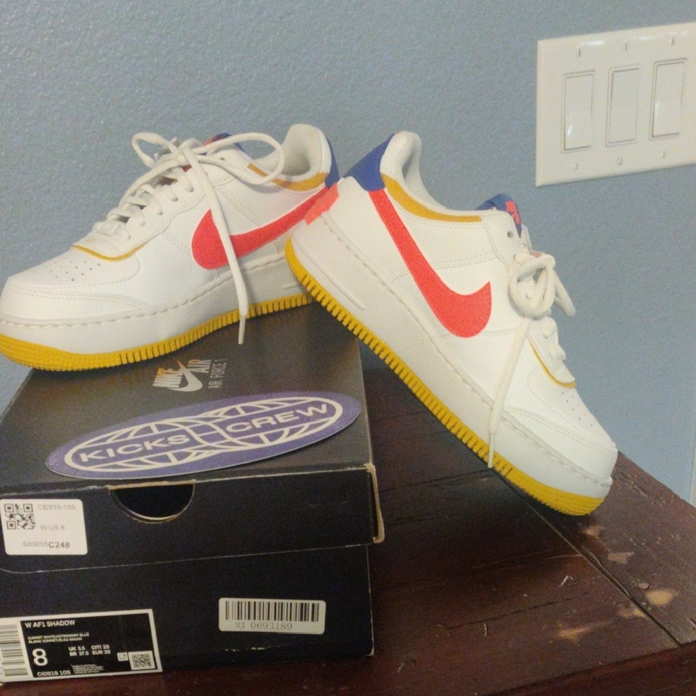 Nike Women's White, Red, and Yellow Sneakers
